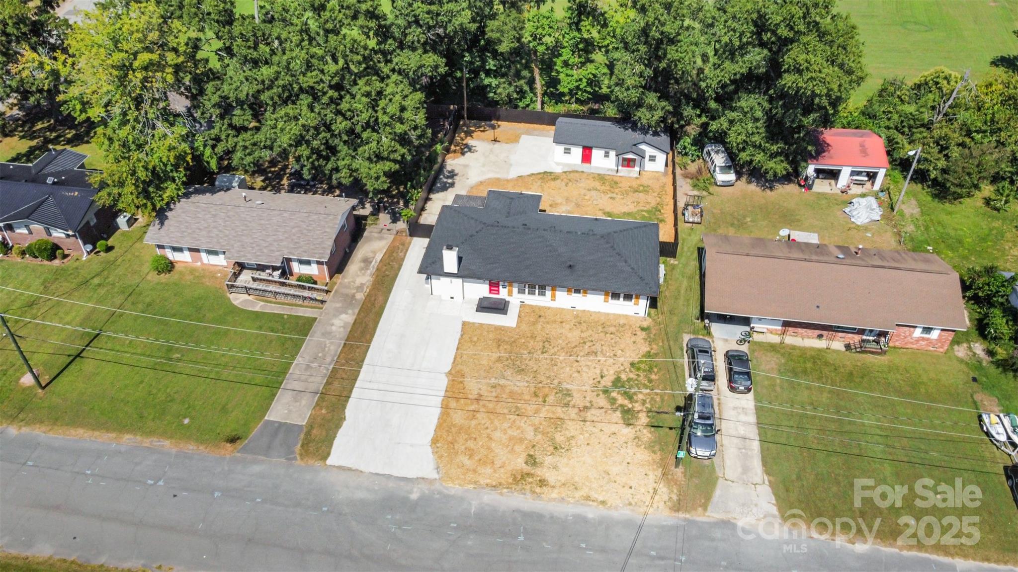 617 Jennings Road, Unit 14 Rock Hill, SC 29730 - Photo 40 of 42 an aerial view of a house with a garden and parking space