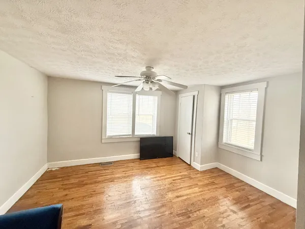 wooden floor that has a window in it