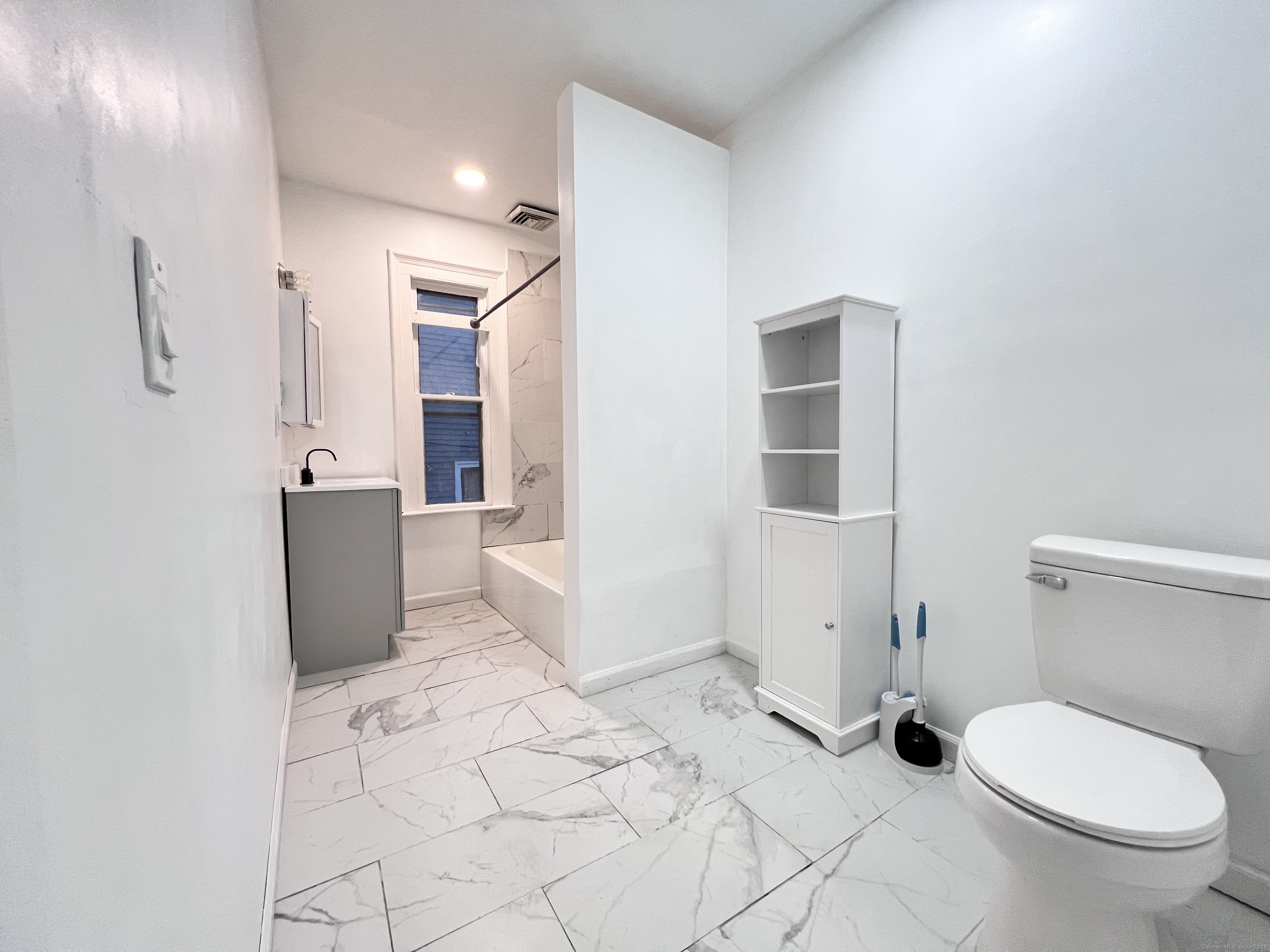 40 Exchange Street, Unit 2 New Haven, CT 06513 - Photo 8 of 12 a bathroom with a sink toilet and shower