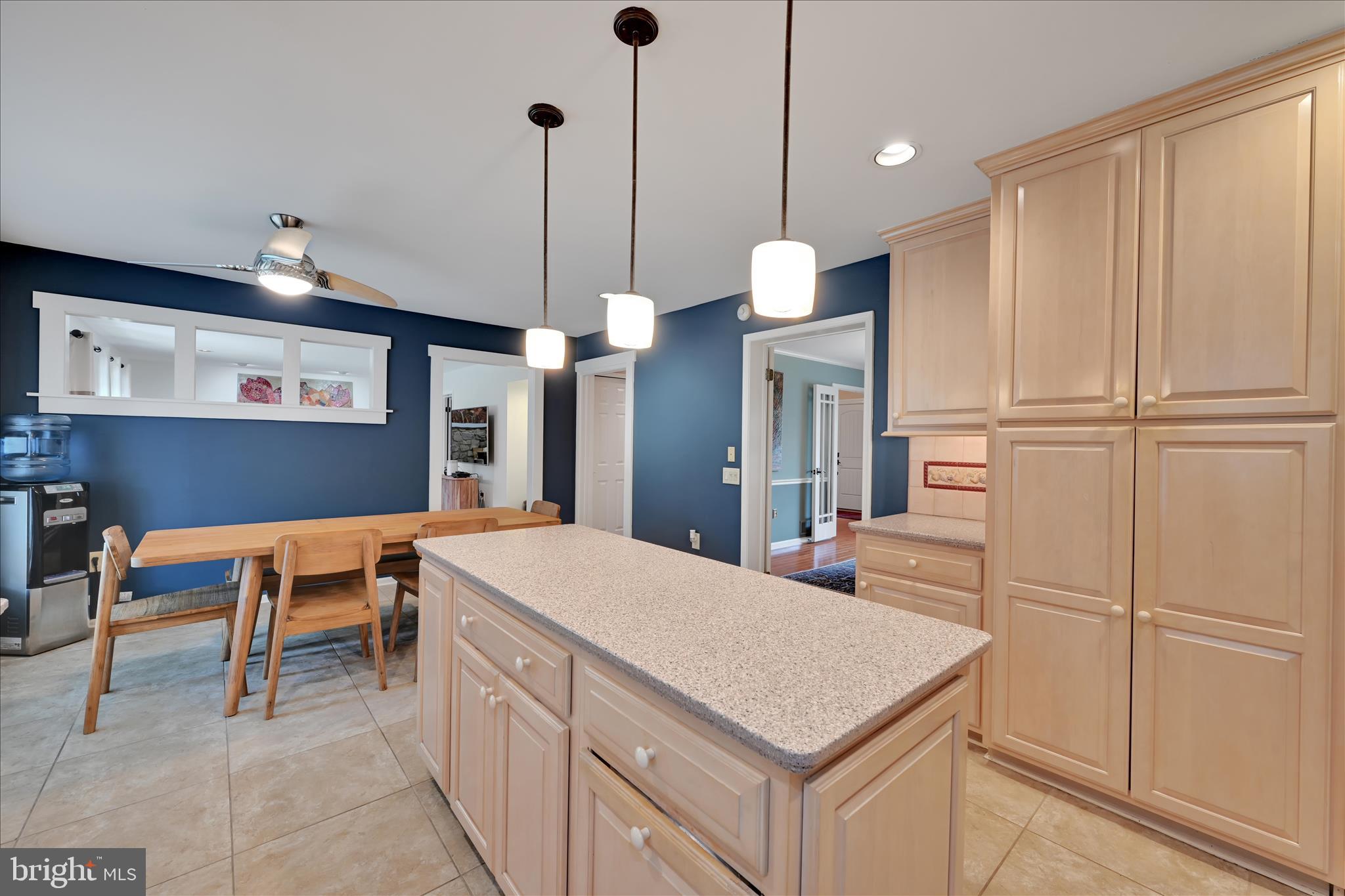 1118 Jarvis Lane Lansdale, PA 19446 - Photo 16 of 45 a kitchen with a table chairs wooden floors and a view of kitchen