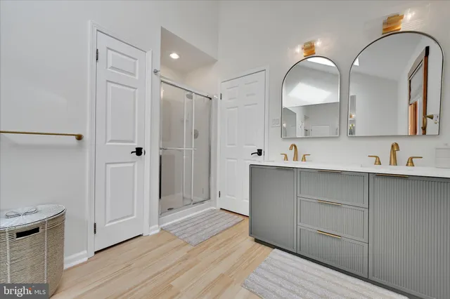 a bathroom with a bathtub and a sink