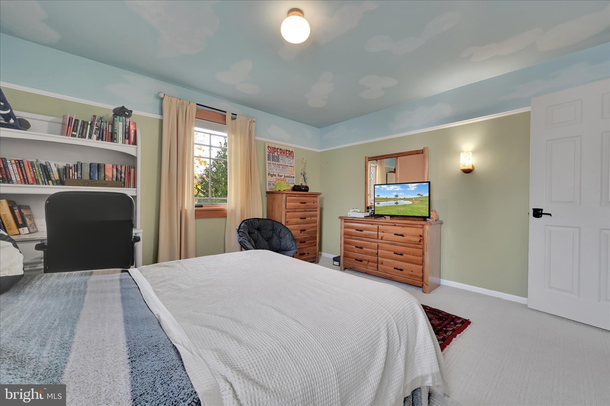 1118 Jarvis Lane Lansdale, PA 19446 - Photo 31 of 45 a bedroom with a bed and a flat tv screen