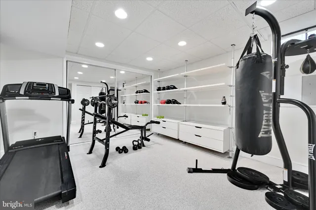 a room with furniture and a flat screen tv