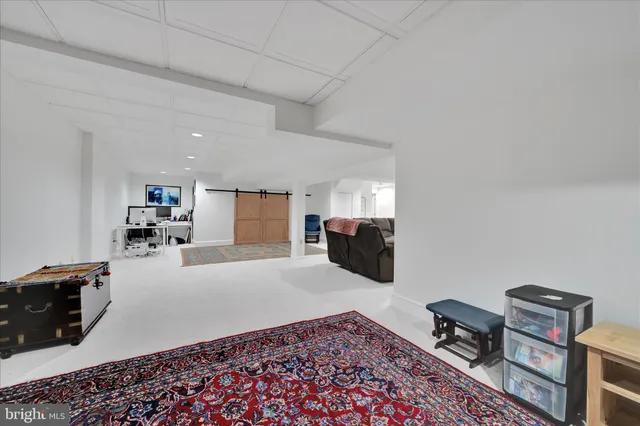 a bedroom with a bed and dresser