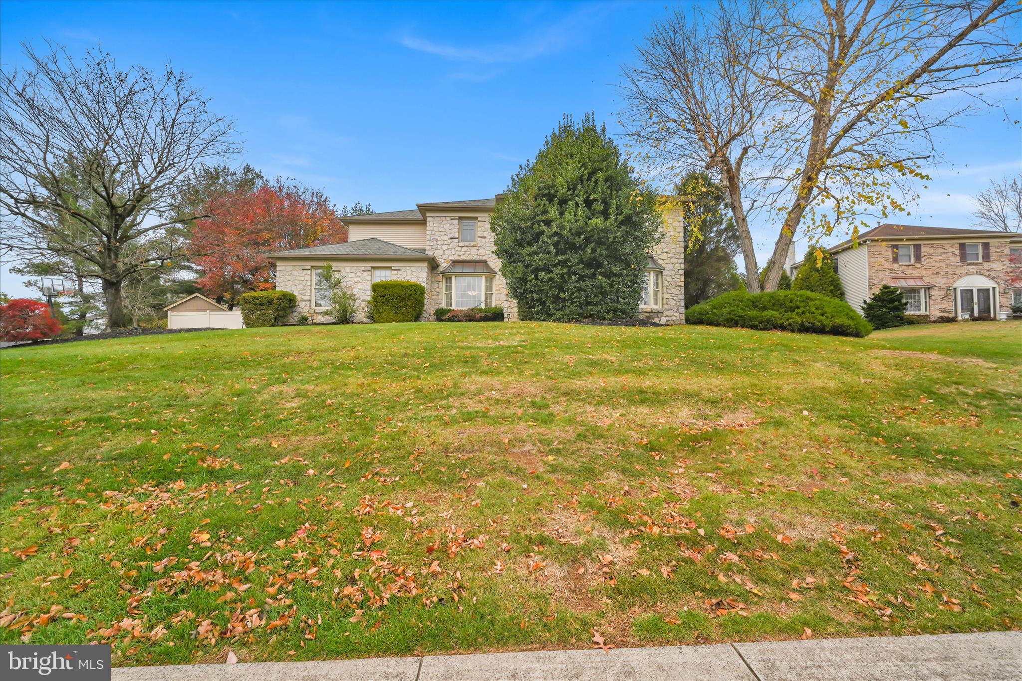 1118 Jarvis Lane Lansdale, PA 19446 - Photo 41 of 45 a front view of a house with a yard