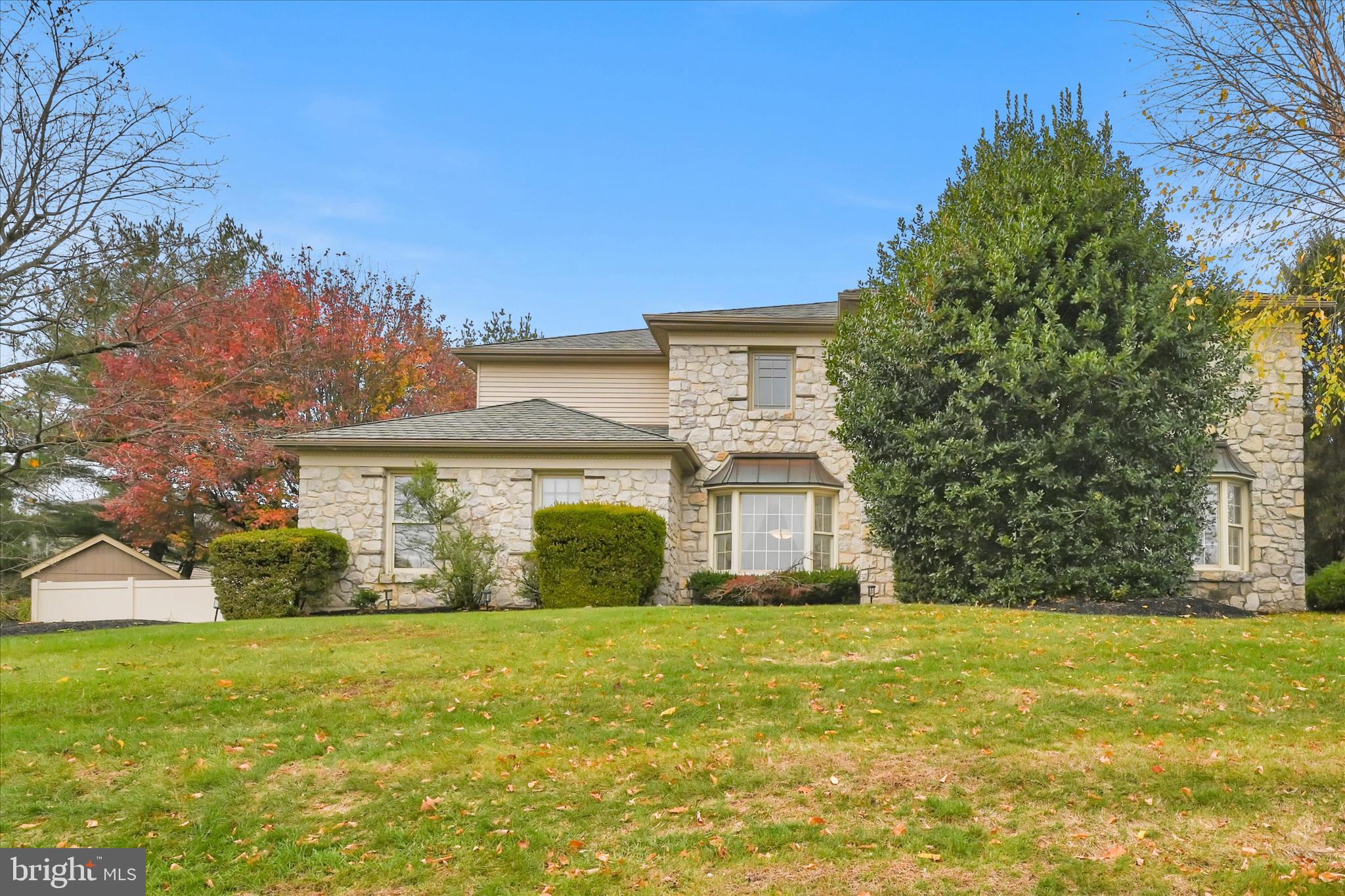 1118 Jarvis Lane Lansdale, PA 19446 - Photo 42 of 45 a front view of house with yard and trees in the background