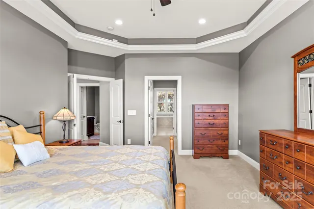 a bedroom with a bed and closet