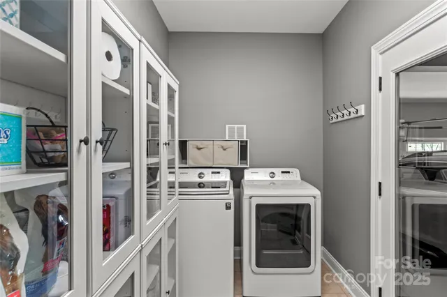 a view of washer and dryer in a utility room