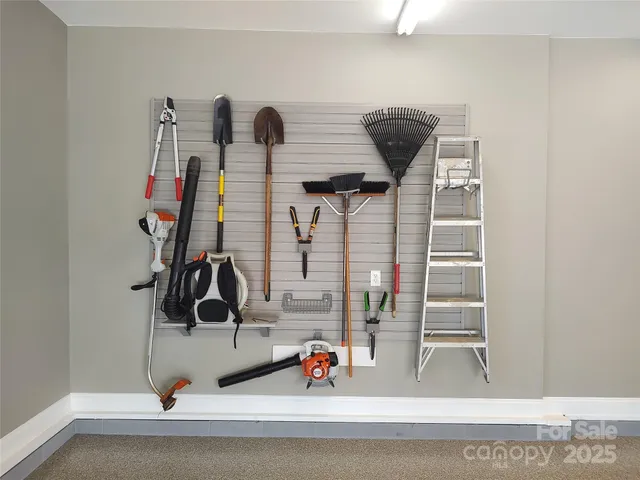 a living room with furniture and air hockey table