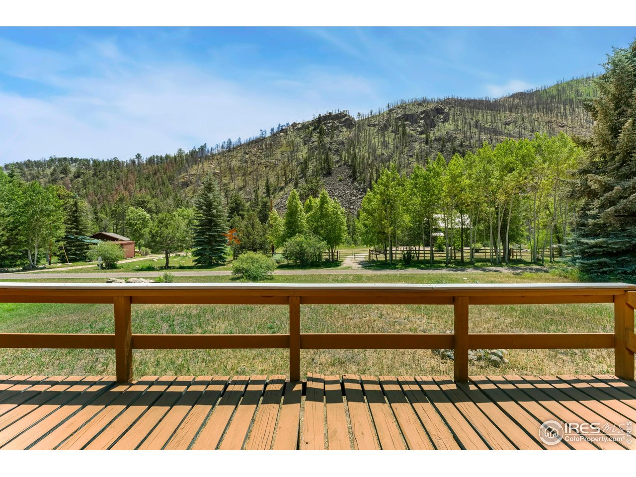 277 Riverside Drive Bellvue, CO 80512 - Photo 7 of 23 a view of mountain view from a balcony