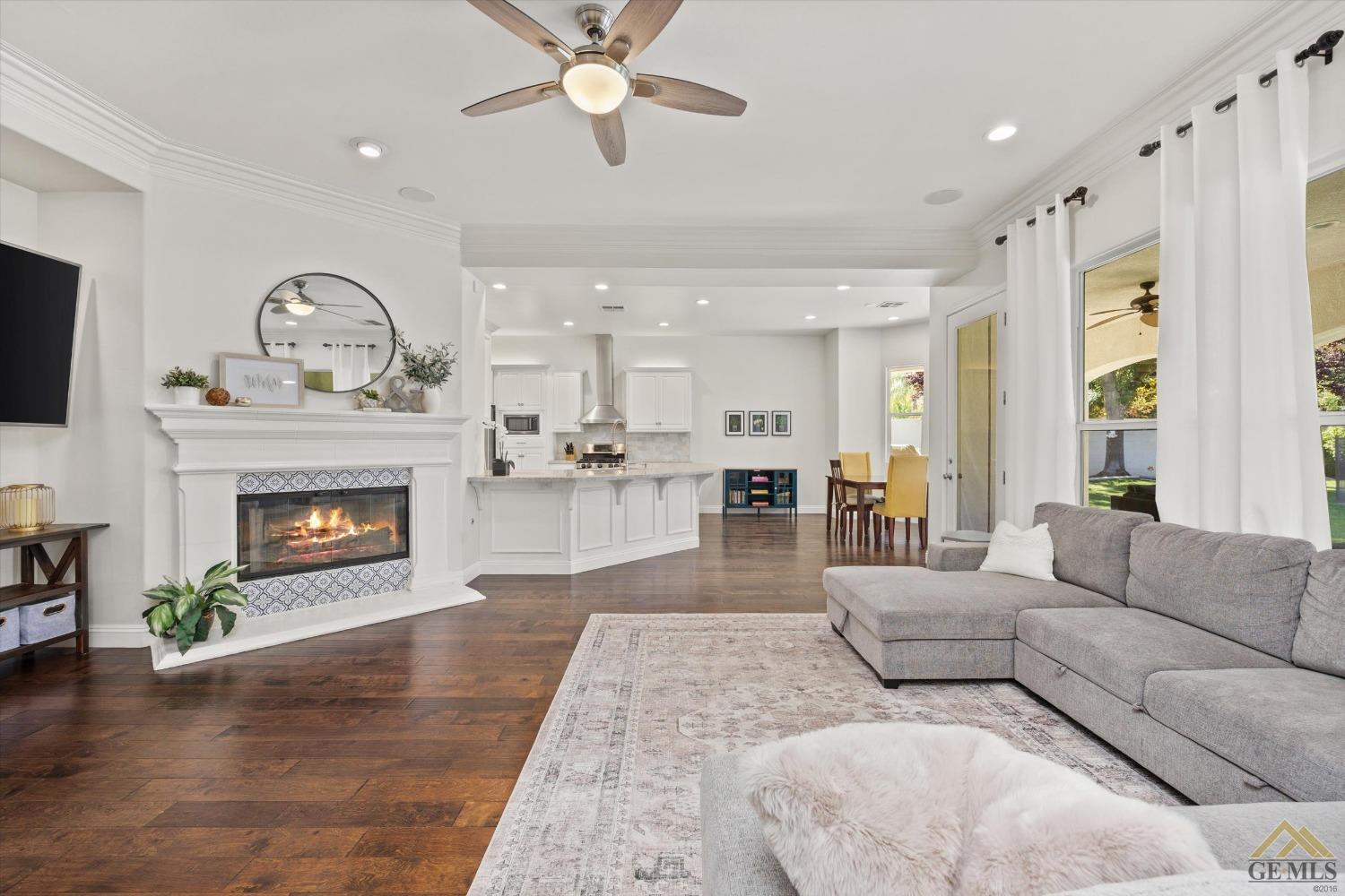 Undisclosed Address Bakersfield, CA 93311 - Photo 13 of 45 a living room with furniture and a fireplace
