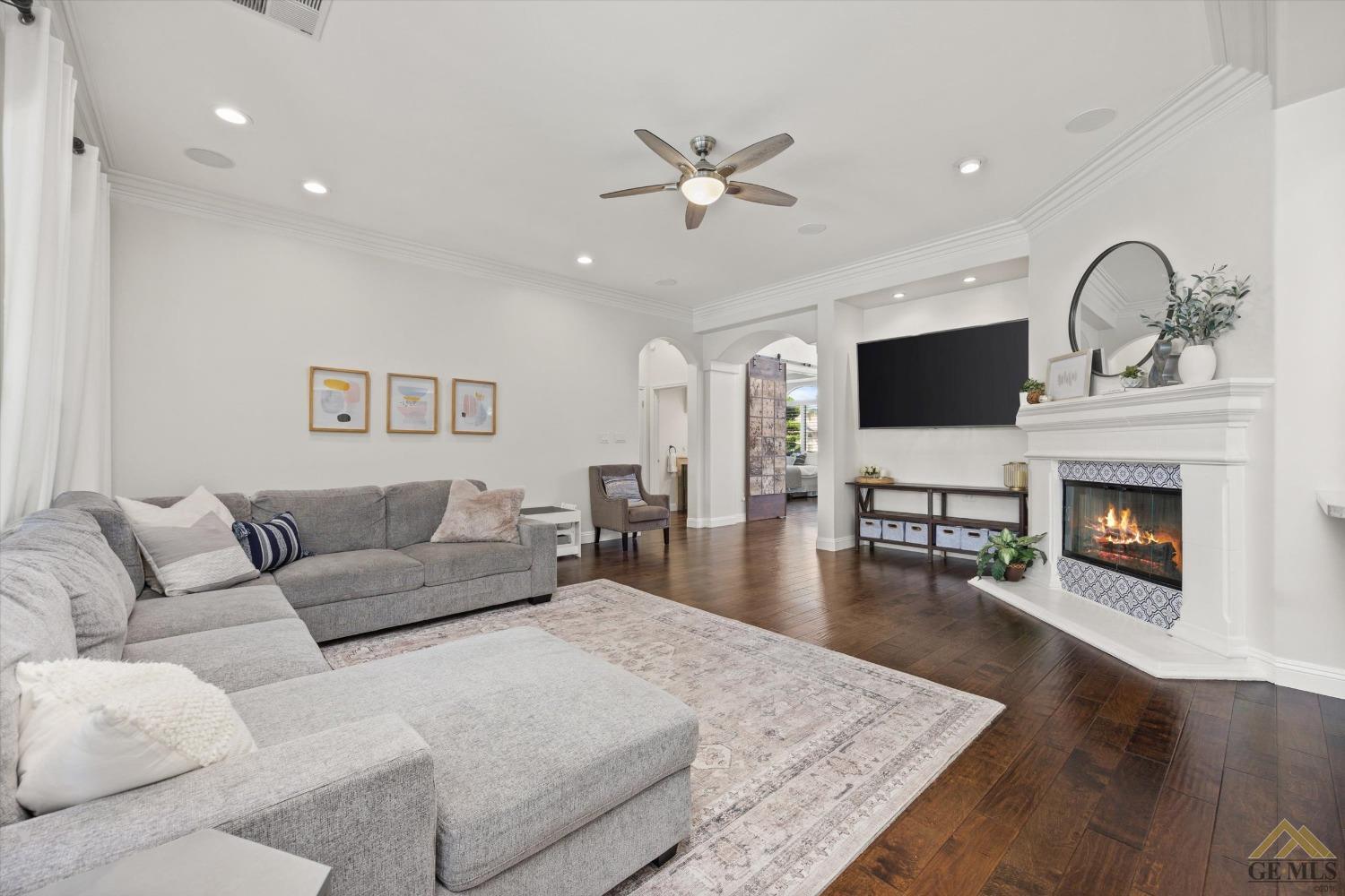 Undisclosed Address Bakersfield, CA 93311 - Photo 14 of 45 a living room with furniture and a fireplace
