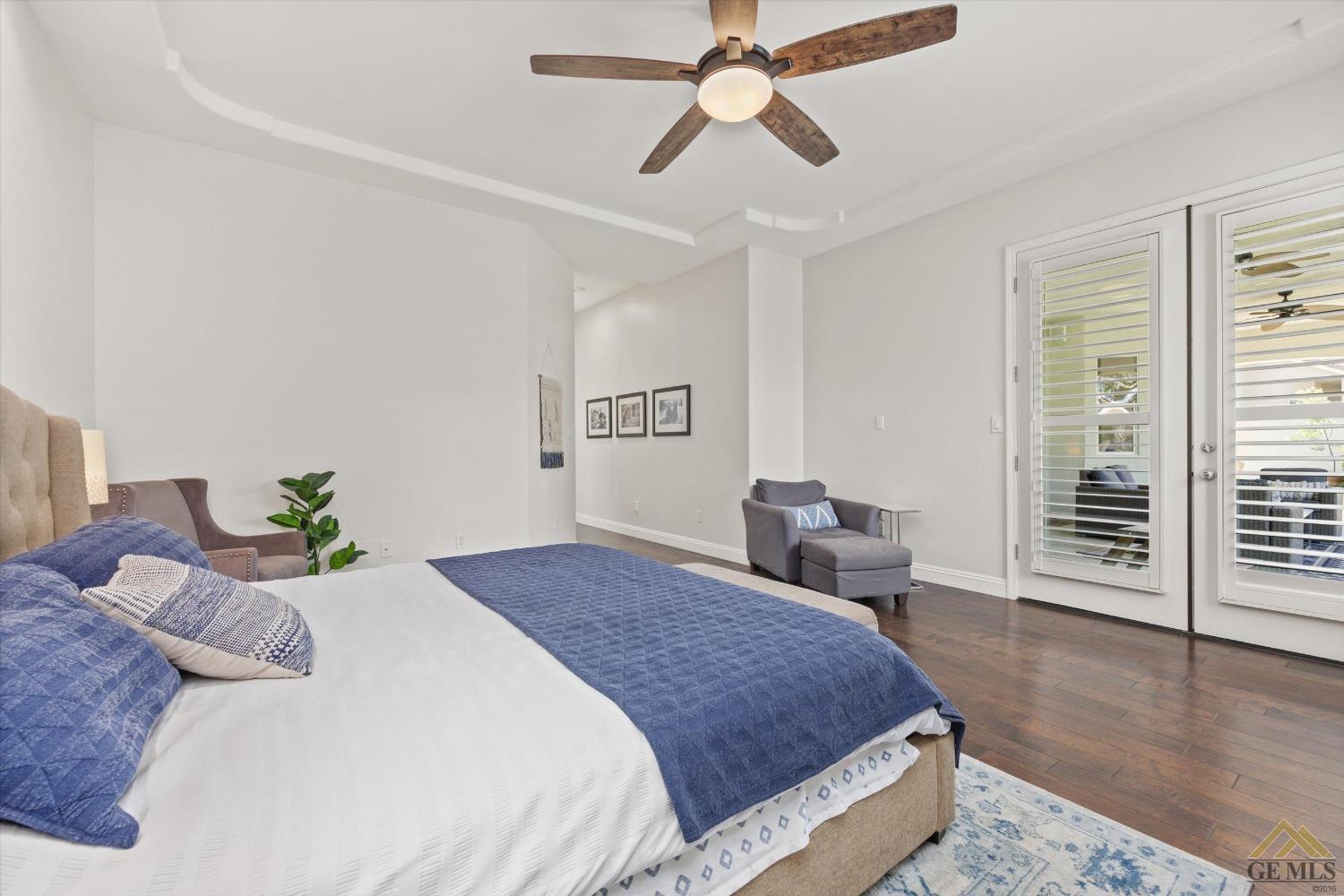 Undisclosed Address Bakersfield, CA 93311 - Photo 25 of 45 a bedroom with a large bed and a window