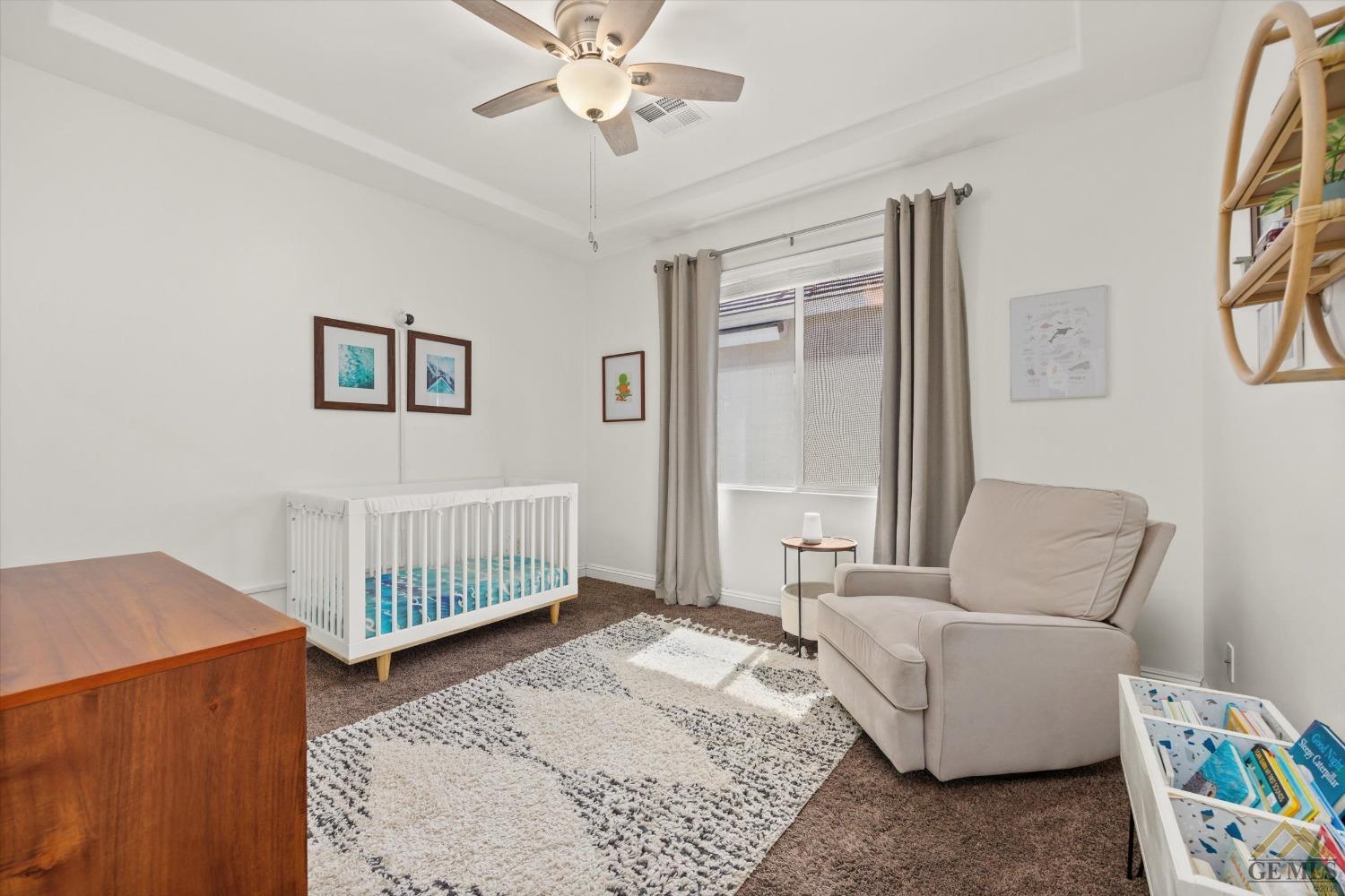 Undisclosed Address Bakersfield, CA 93311 - Photo 32 of 45 a bedroom with furniture and a window