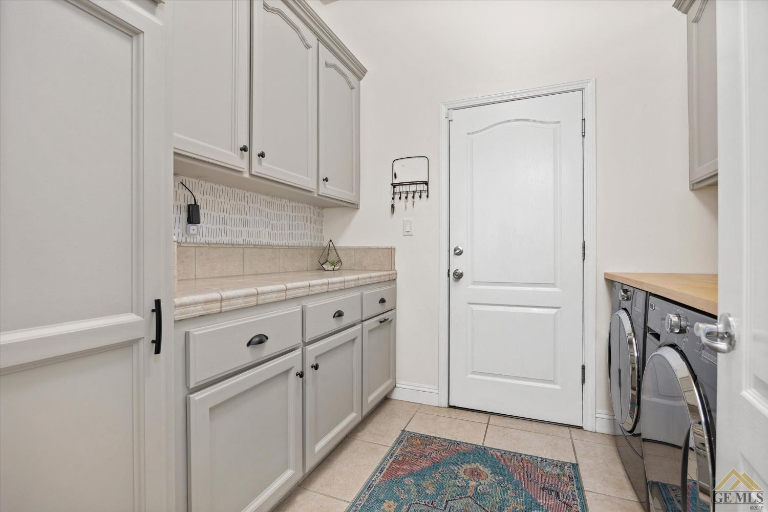 Undisclosed Address Bakersfield, CA 93311 - Photo 38 of 45 a view of a storage and utility room with closet