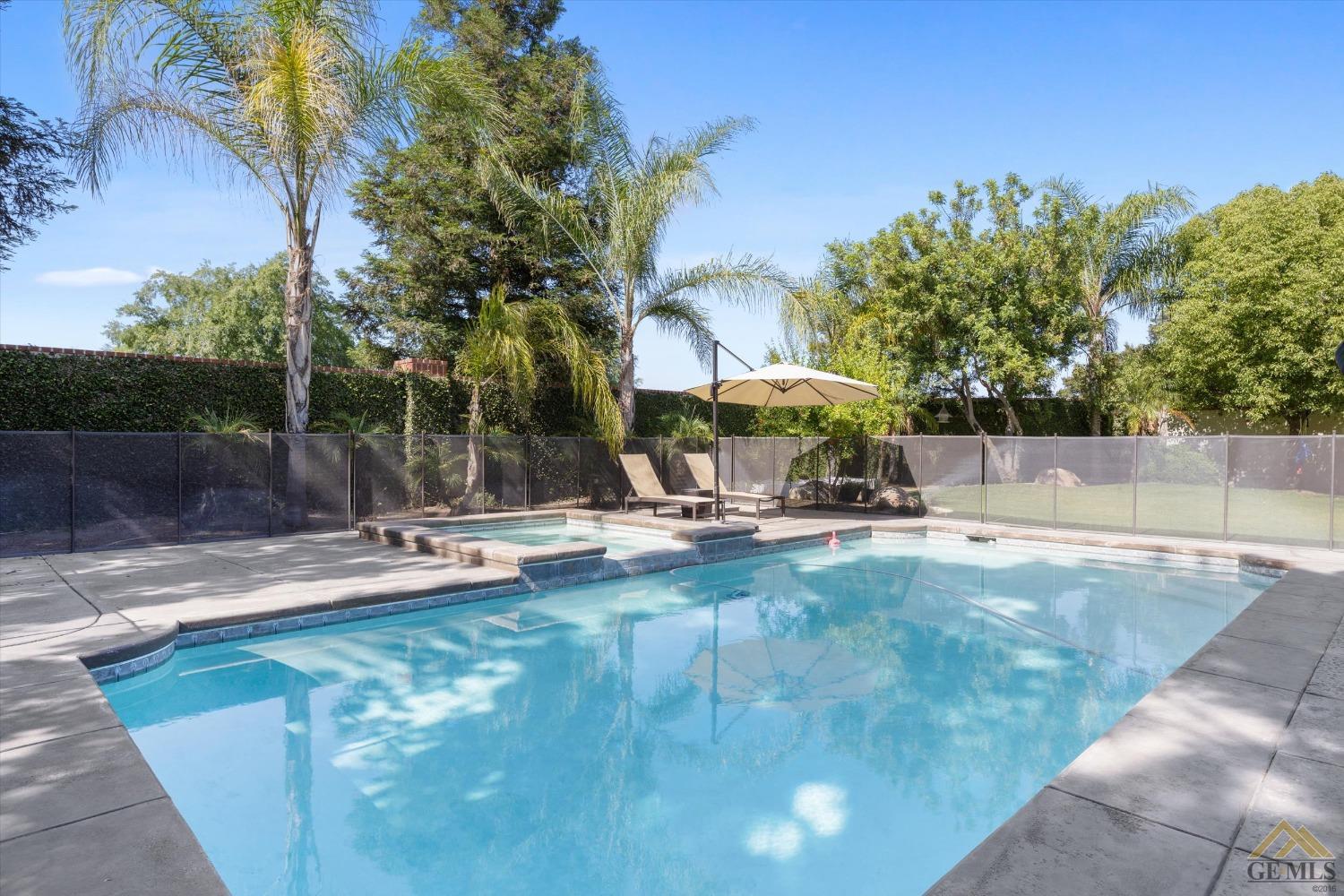 Undisclosed Address Bakersfield, CA 93311 - Photo 40 of 45 a view of a swimming pool with sitting area