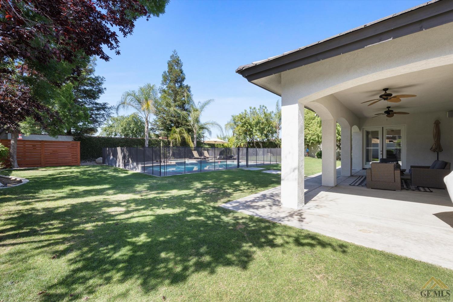Undisclosed Address Bakersfield, CA 93311 - Photo 41 of 45 a view of a house with a yard porch and sitting area