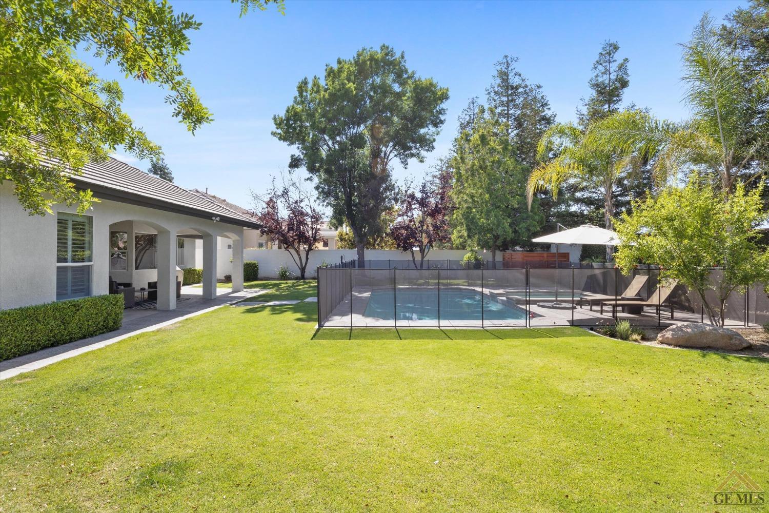 Undisclosed Address Bakersfield, CA 93311 - Photo 45 of 45 a view of a house with swimming pool and sitting area