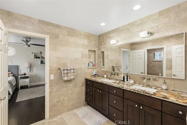 a utility room with sink dryer and washer