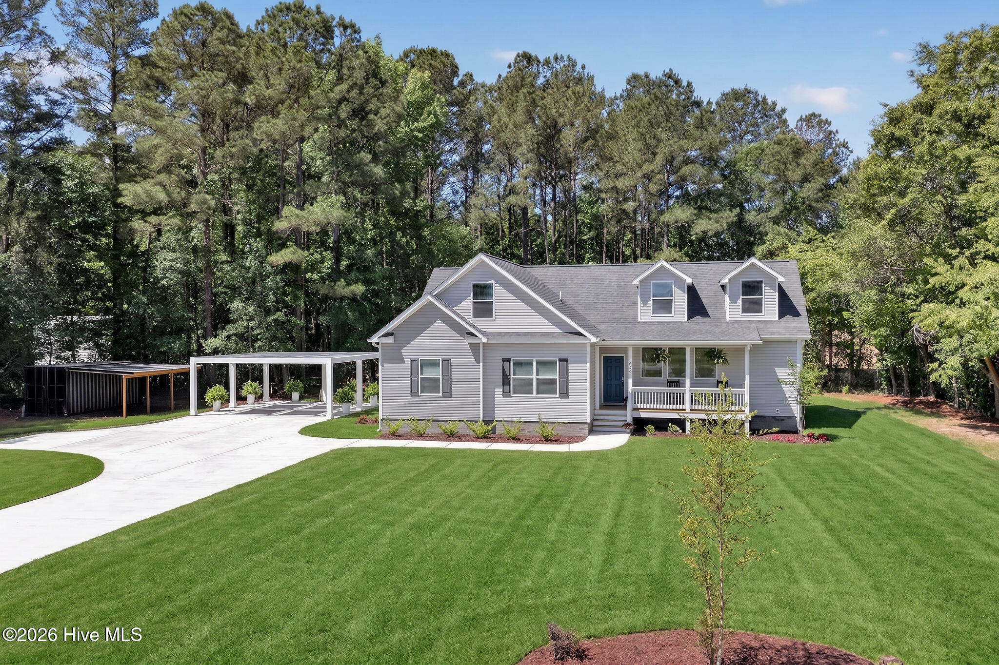 451 Governors Road Southeast Winnabow, NC 28479 - Photo 3 of 60 451GovernorsRoadSE-56_Digital_Lawn_Repai