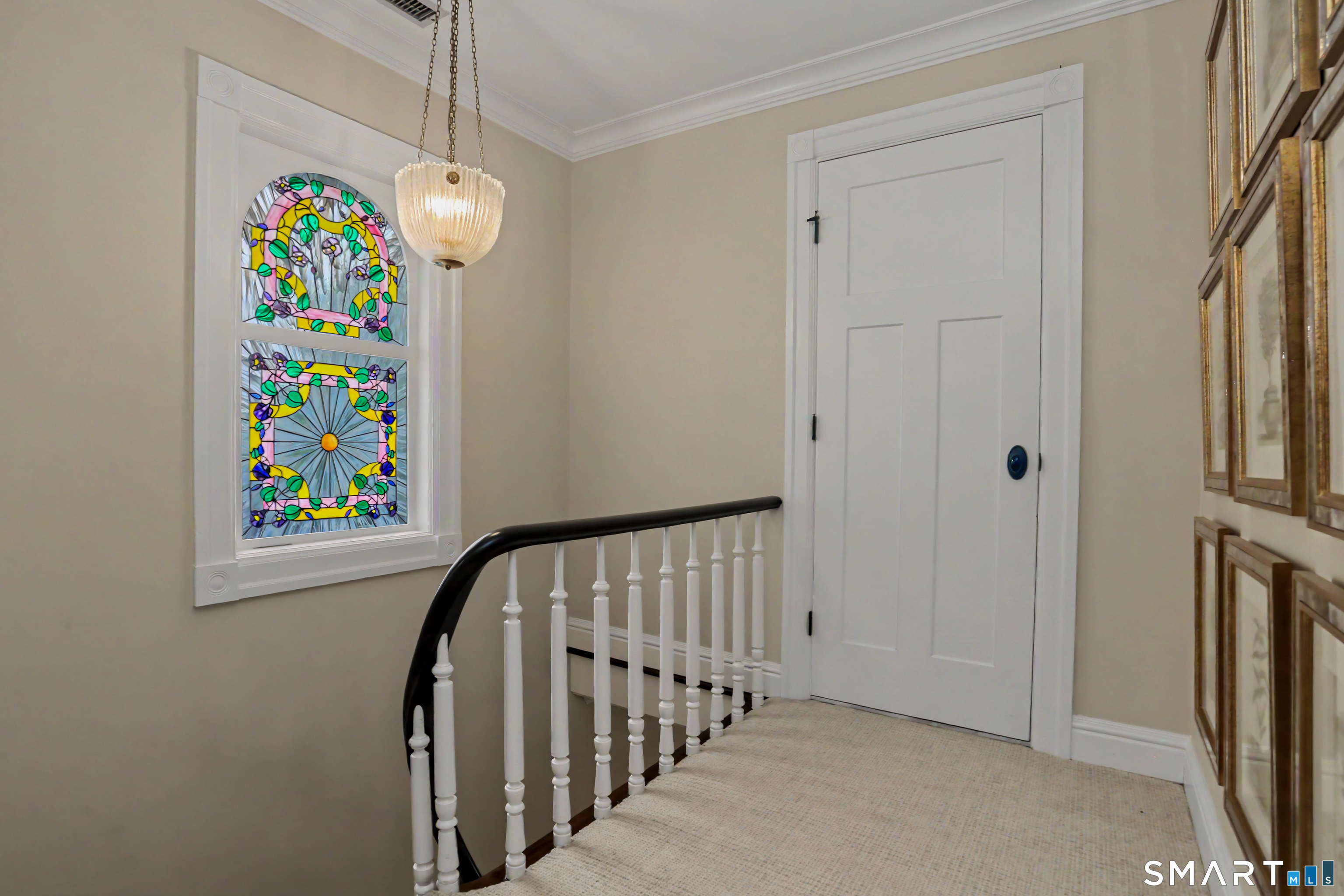 36 Catoonah Street, Unit 18 Ridgefield, CT 06877 - Photo 23 of 40 a view of an entryway with wooden floor