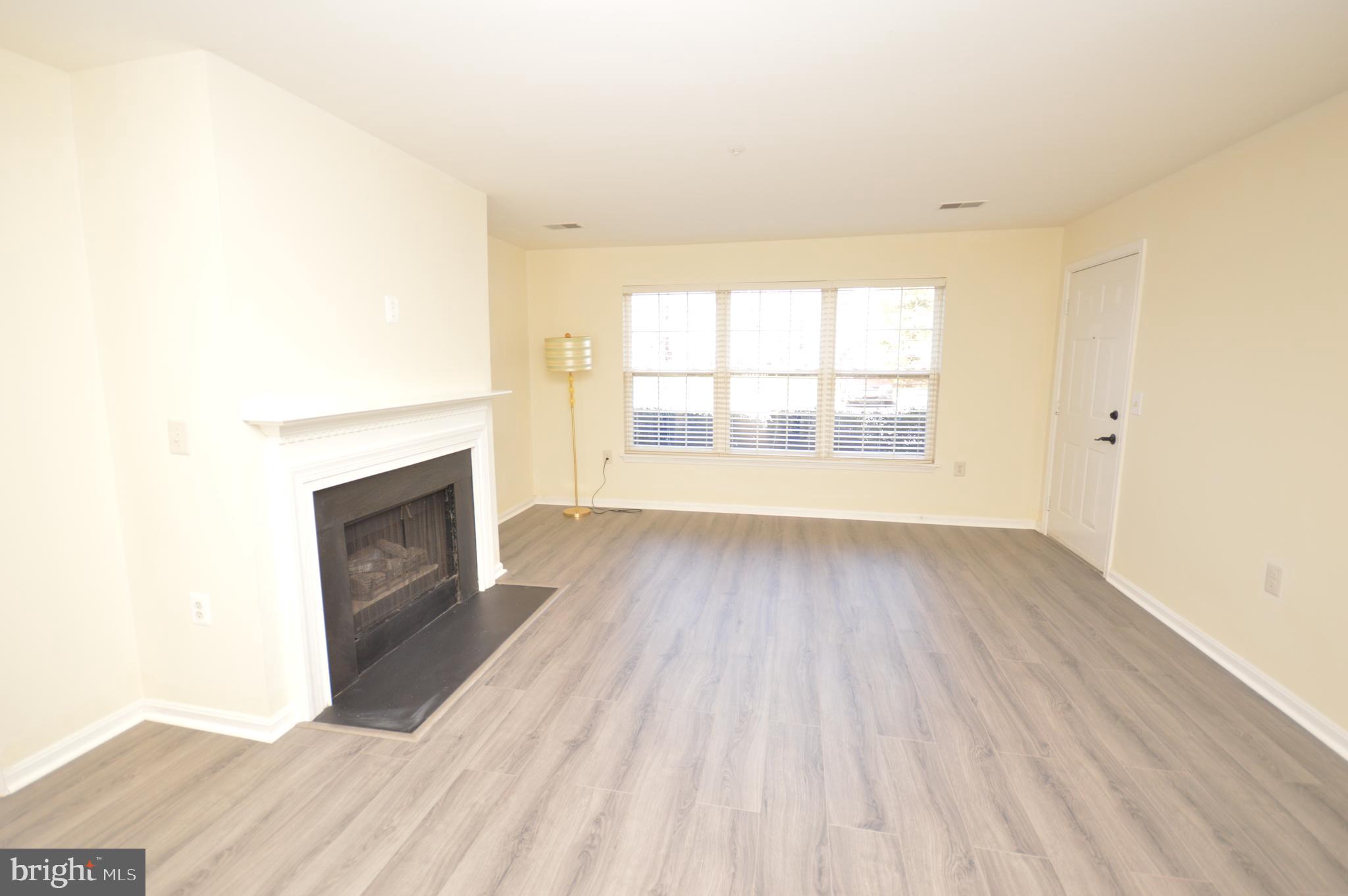 625 Constellation Square Southeast, Unit A Leesburg, VA 20175 - Photo 7 of 38 Living room