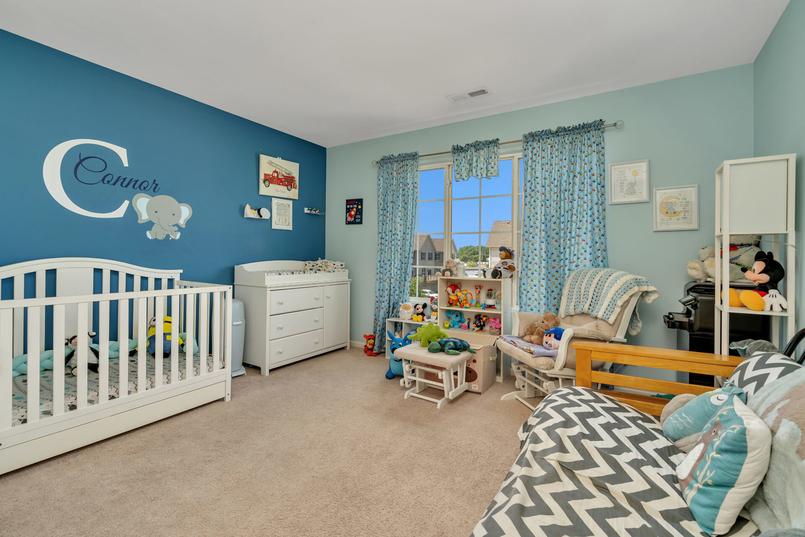 10323 Kerry Ridge Court, Unit 10323 Chicago Ridge, IL 60415 - Photo 13 of 16 a bedroom with furniture and a window