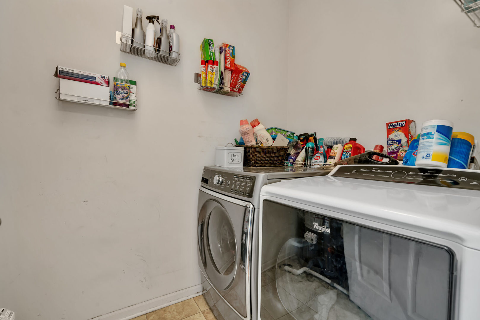 10323 Kerry Ridge Court, Unit 10323 Chicago Ridge, IL 60415 - Photo 10 of 16 a utility room with lots of clutter and cabinets