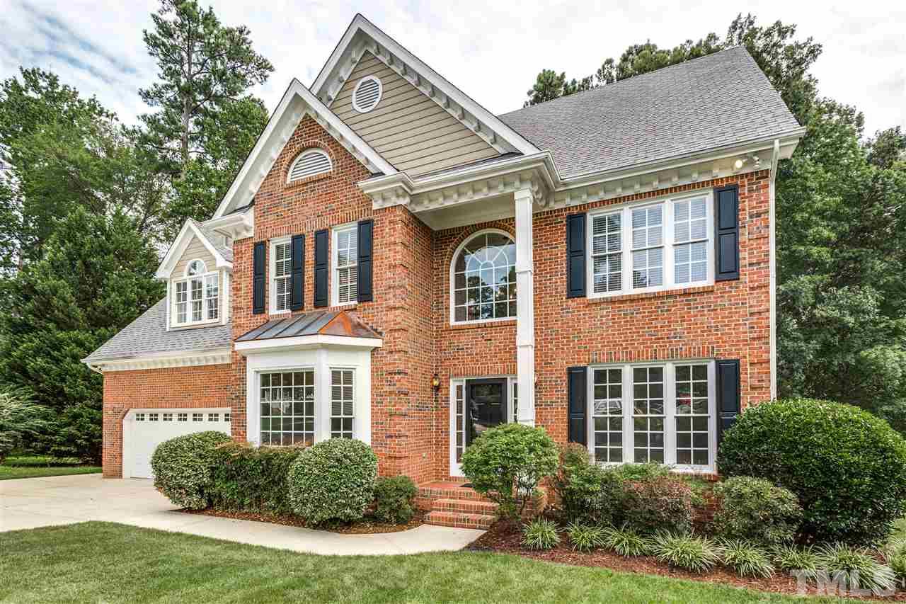 8401 Largo Springs Court Raleigh, NC 27613 - Photo 2 of 25 front view of a house with a yard
