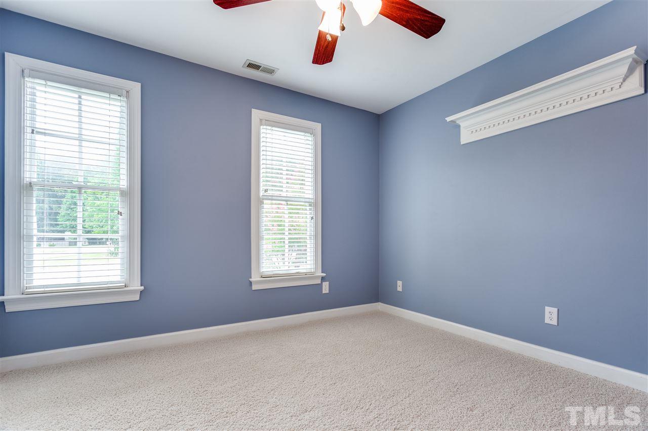 8401 Largo Springs Court Raleigh, NC 27613 - Photo 19 of 25 a view of an empty room with a window