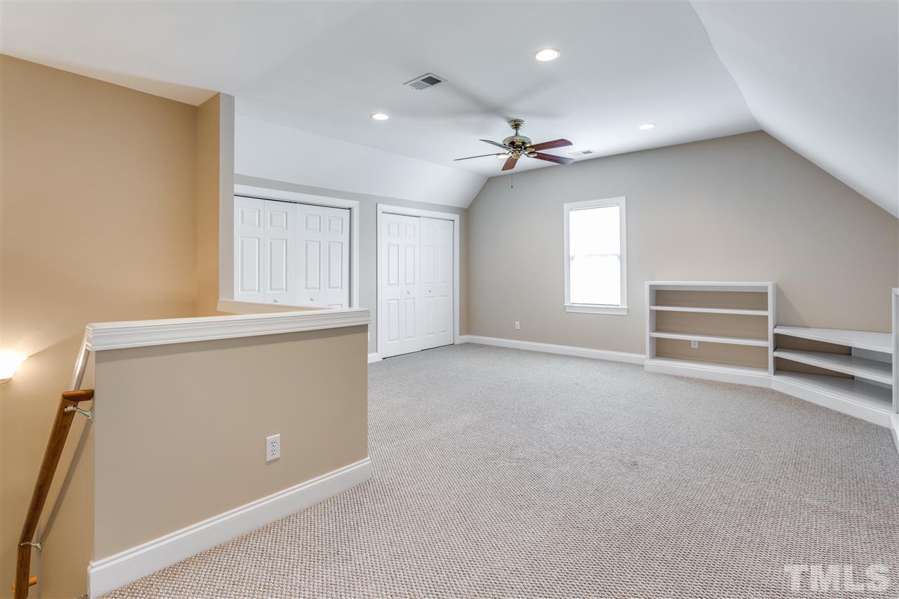 8401 Largo Springs Court Raleigh, NC 27613 - Photo 23 of 25 a view of an empty room with a window