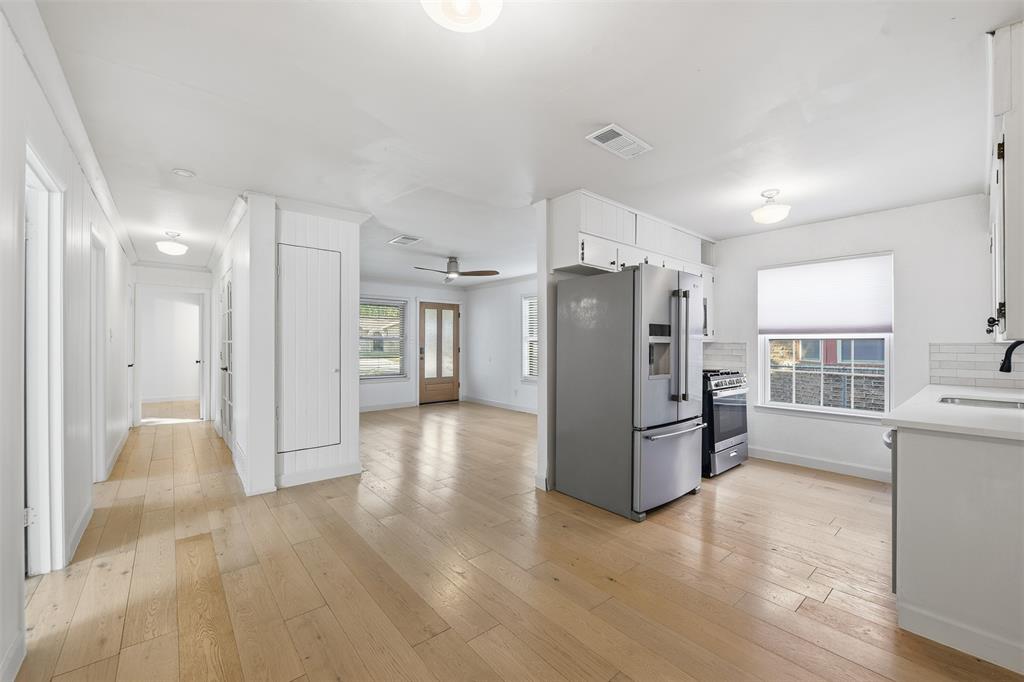 402 Vicki Street Keller, TX 76248 - Photo 17 of 21 a kitchen with stainless steel appliances a refrigerator and a stove top oven