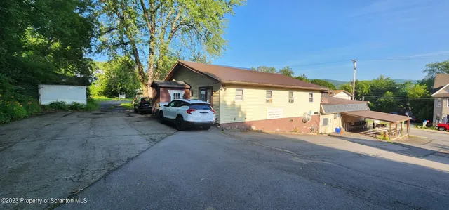 a view of a house with a patio