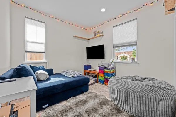 a bedroom with a bed and a cabinets