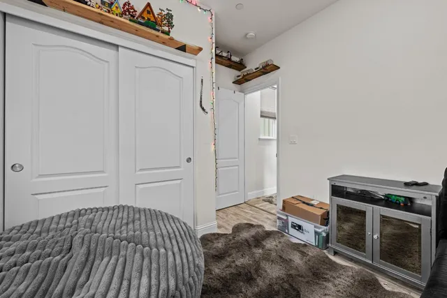 a bathroom with a sink toilet vanity and tub