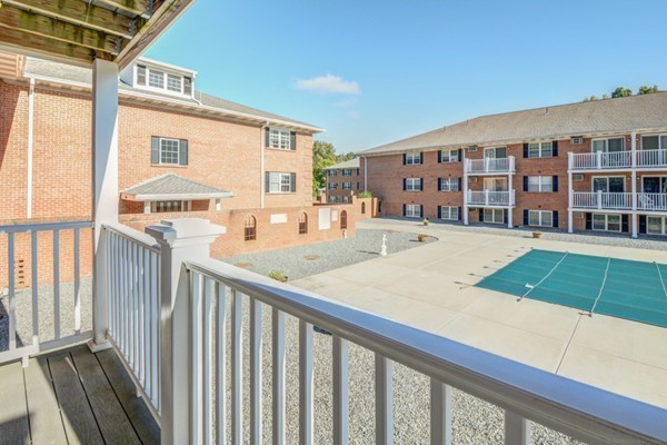 79 Leonard Road, Unit 79 Boxborough, MA 01719 - Photo 13 of 16 a view of a building from the balcony