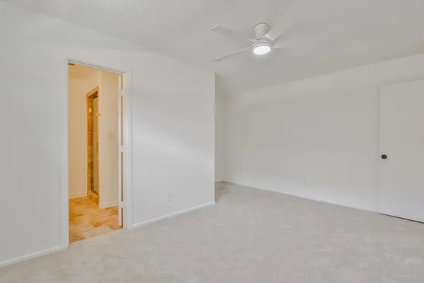 an empty room with a bathroom