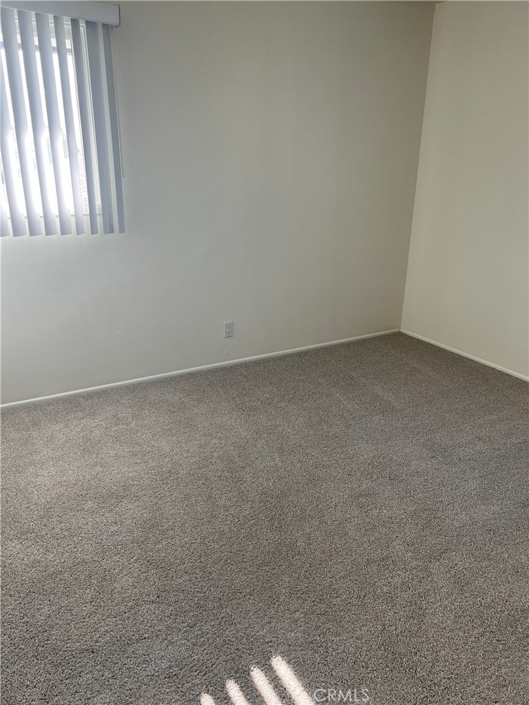 8721 Squires Circle Huntington Beach, CA 92646 - Photo 23 of 43 a view of an empty room and window