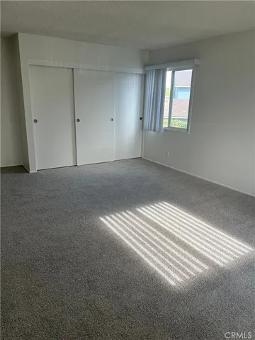 an entryway with wooden floor