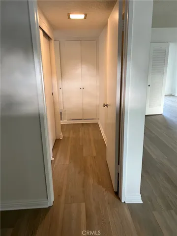 a view of a swimming pool with a yard