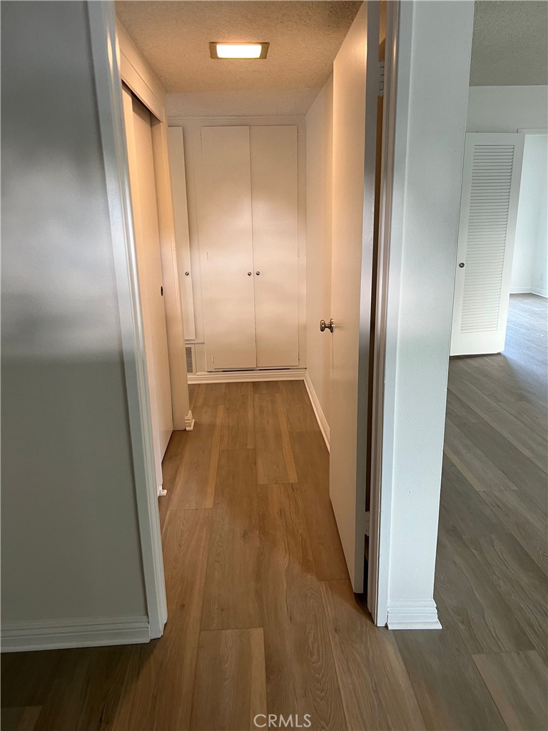 8721 Squires Circle Huntington Beach, CA 92646 - Photo 38 of 43 an entryway with wooden floor