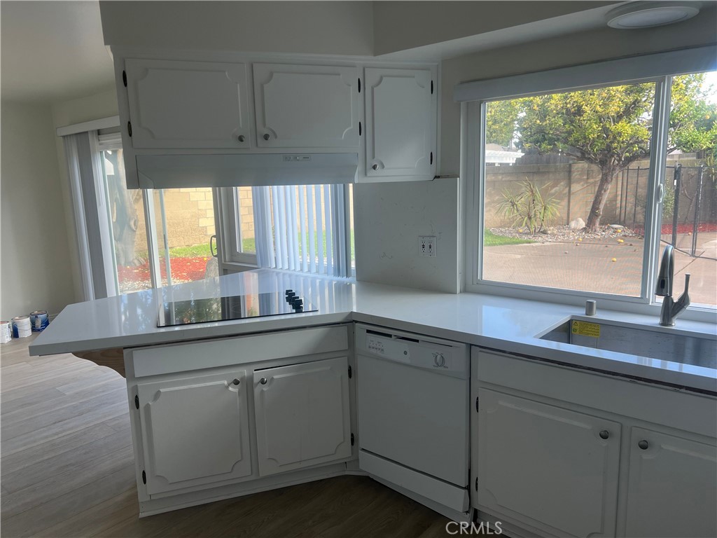 8721 Squires Circle Huntington Beach, CA 92646 - Photo 10 of 43 a kitchen with sink and window