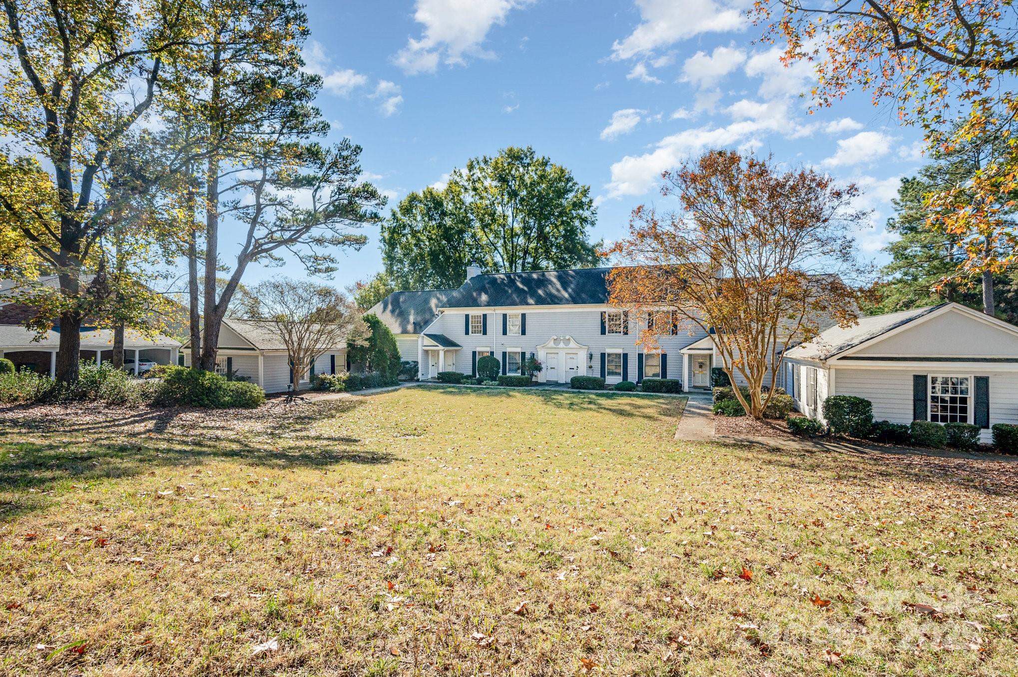 7047 Quail Hill Road Charlotte, NC 28210 - Photo 2 of 29 a view of a house with a snow in the yard