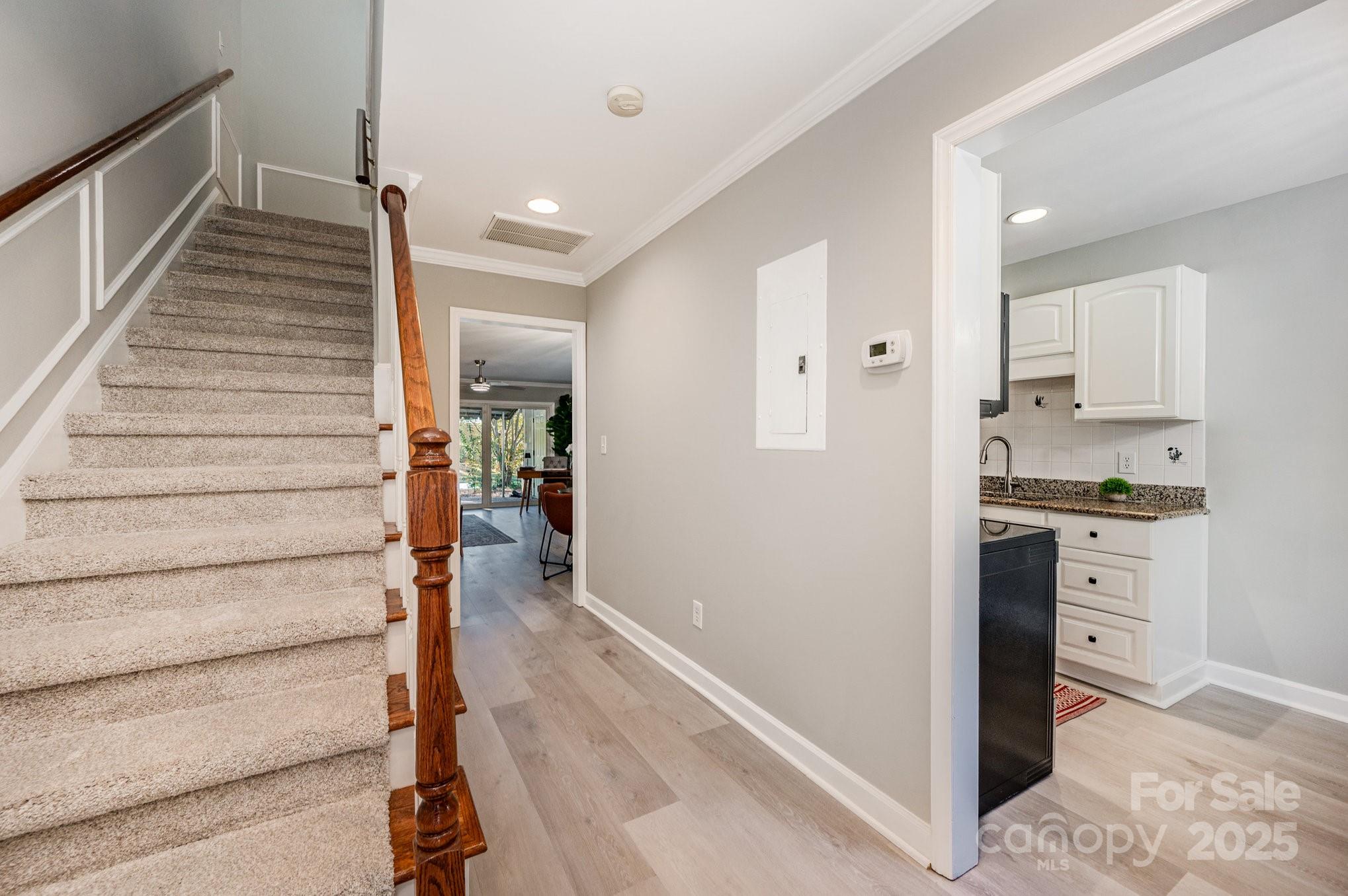 7047 Quail Hill Road Charlotte, NC 28210 - Photo 7 of 29 a view of entryway and kitchen