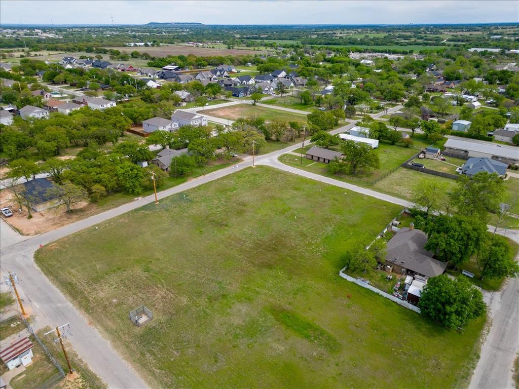 Tbd Lot 2 Tbd Tolar, TX 76476 - Photo 7 of 12 an aerial view of residential houses with outdoor space and swimming pool
