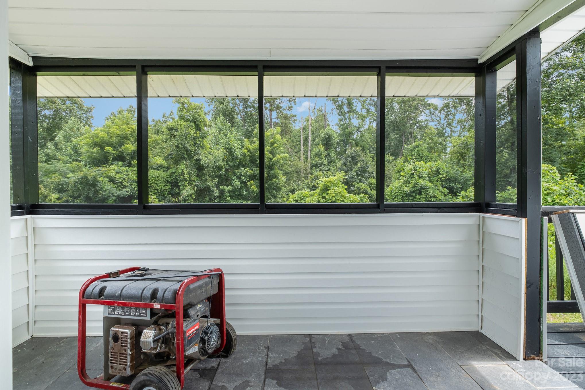 260 Upper Stanley Road Stanley, NC 28164 - Photo 14 of 18 a view of a two room with furniture and a window