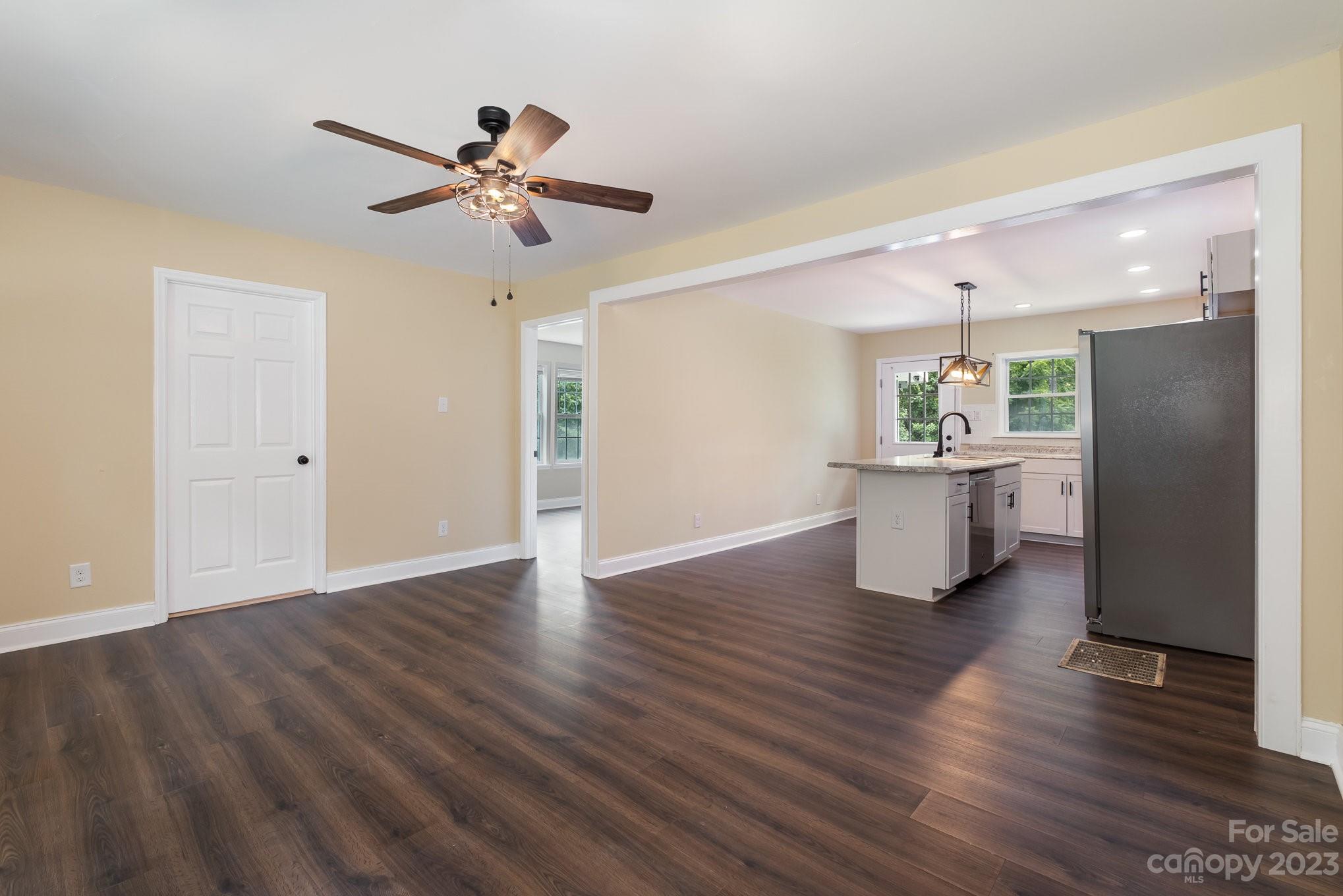 260 Upper Stanley Road Stanley, NC 28164 - Photo 5 of 18 a view of empty room with wooden floor and window