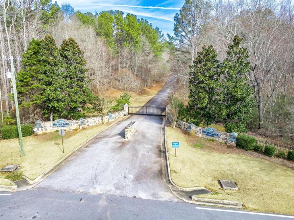 467 Rivers Road Fayetteville, GA 30214 - Photo 2 of 19 a view of a yard with potted plants