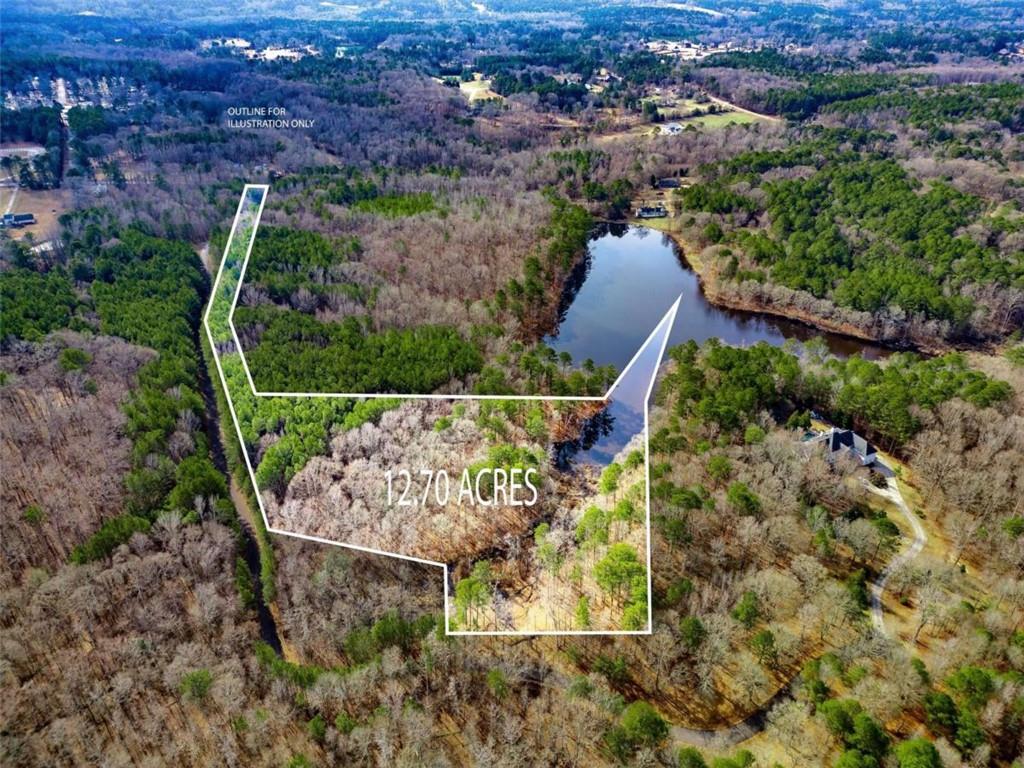 467 Rivers Road Fayetteville, GA 30214 - Photo 5 of 19 an aerial view of a house with a yard and lake view