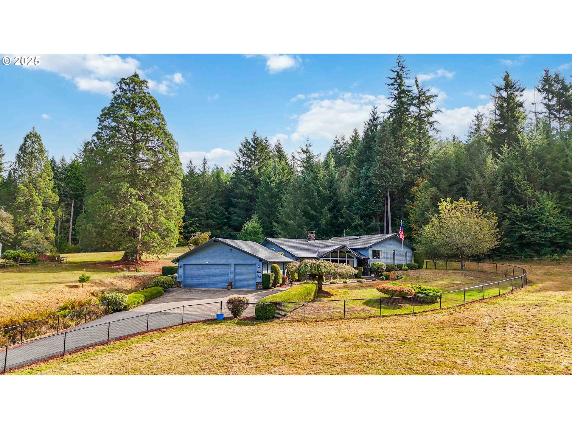 720 Abernathy Creek Road Longview, WA 98632 - Photo 3 of 44 a view of a house with swimming pool and sitting area